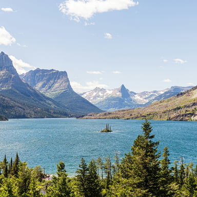 Turquoise lake surrounded by mountains in Glacier National Park